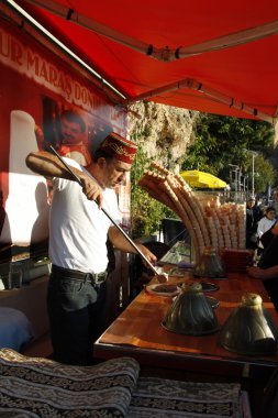 Ice cream street vendor in Turkey clipart