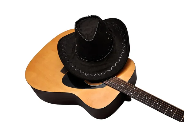 Guitarra e chapéu acústicos — Fotografia de Stock
