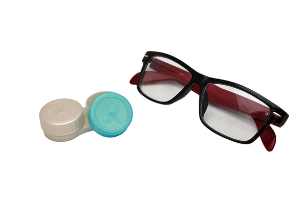 Lente de caja y gafas —  Fotos de Stock