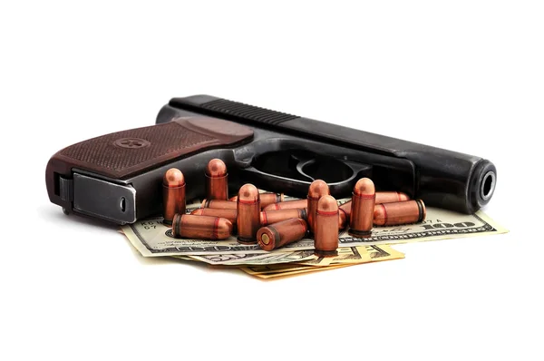 Pistola, cartuchos e dólares — Fotografia de Stock