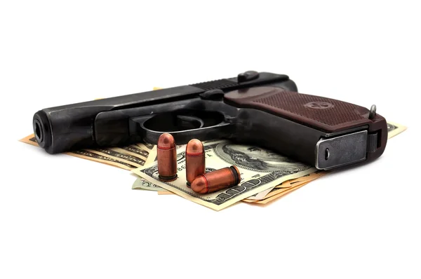 Pistola, cartuchos y dólares — Foto de Stock