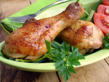 Chicken legs with vegetables clipart