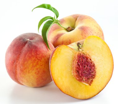 Ripe peach fruit with leaves and slises clipart