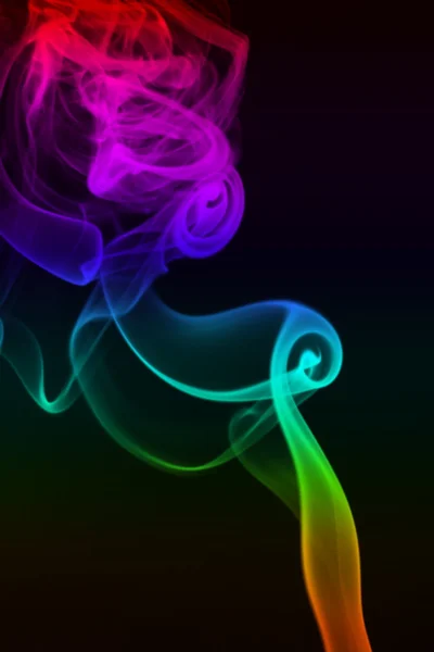 Vloeiende kleurrijke rook. — Stockfoto