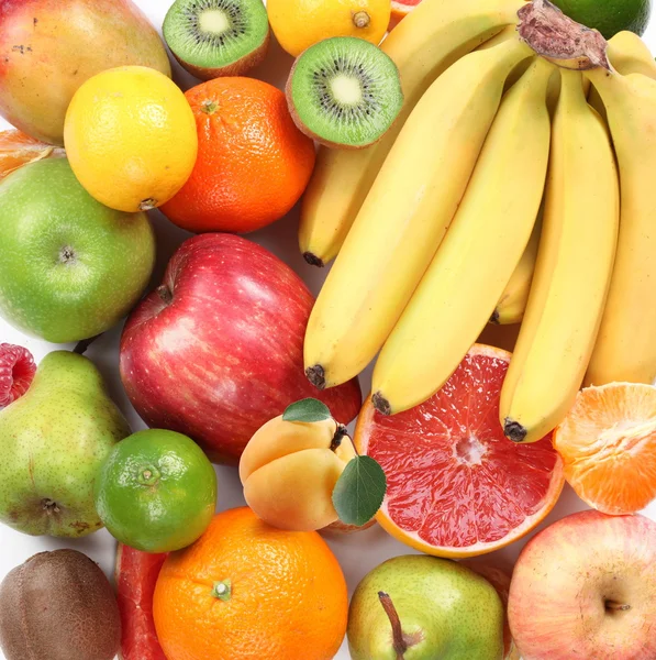 Grupa owoców zajmuje całą ramkę. — Zdjęcie stockowe