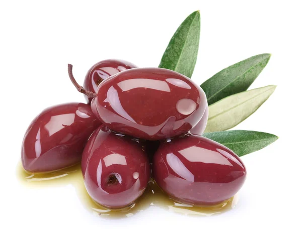 Olive viola sott'olio con foglie — Foto Stock