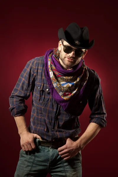 Cowboy in red background — Stock Photo, Image