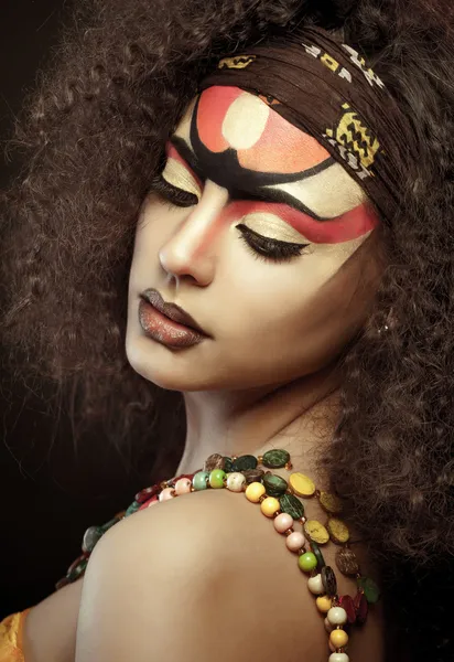 Beautiful African woman with artistic make-up — Stock Photo, Image