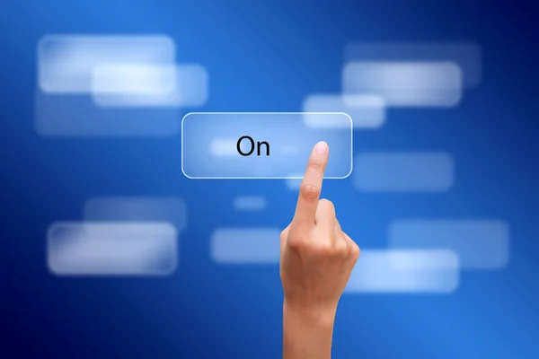 Hand pressing button on a touch screen — Stock Photo, Image