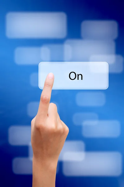 Hand pressing button on a touch screen — Stock Photo, Image