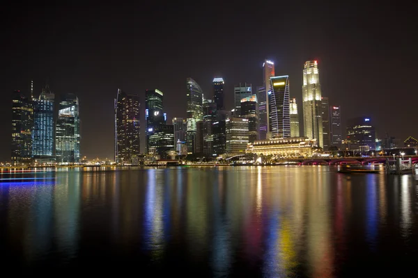 stock image The Singapore skyline at night from across the bay