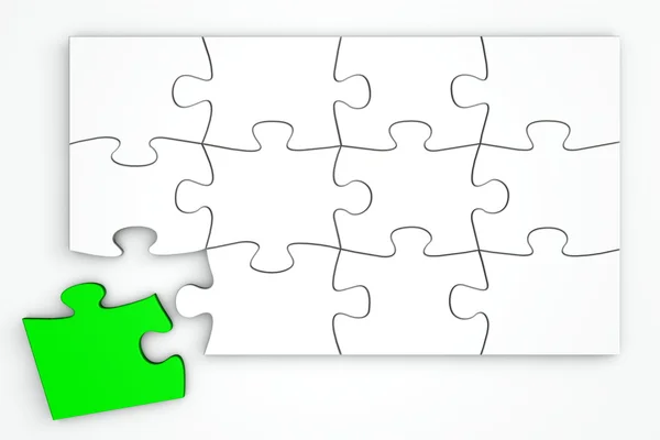 Biały puzzle z góry - osobny kawałek zielonej — Zdjęcie stockowe
