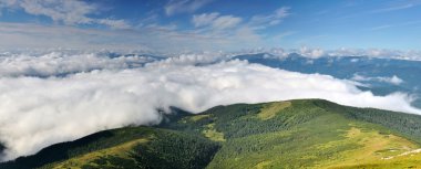 Natural cloudy valley in the mountains clipart