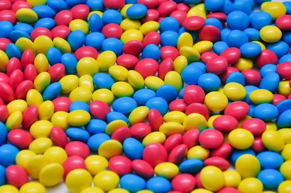 Strzał zbliżenie kolorowe cukierki — Zdjęcie stockowe