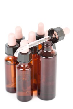 Small apothecary bottles with an eyedropper clipart