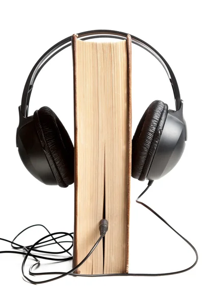 Buch mit Kopfhörer verkabelt — Stockfoto