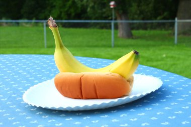 Banana dog in a bun clipart