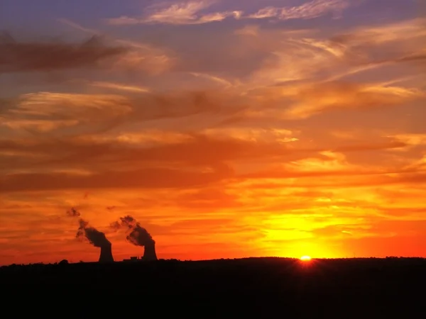 Stock image Sunset over nuclear plant