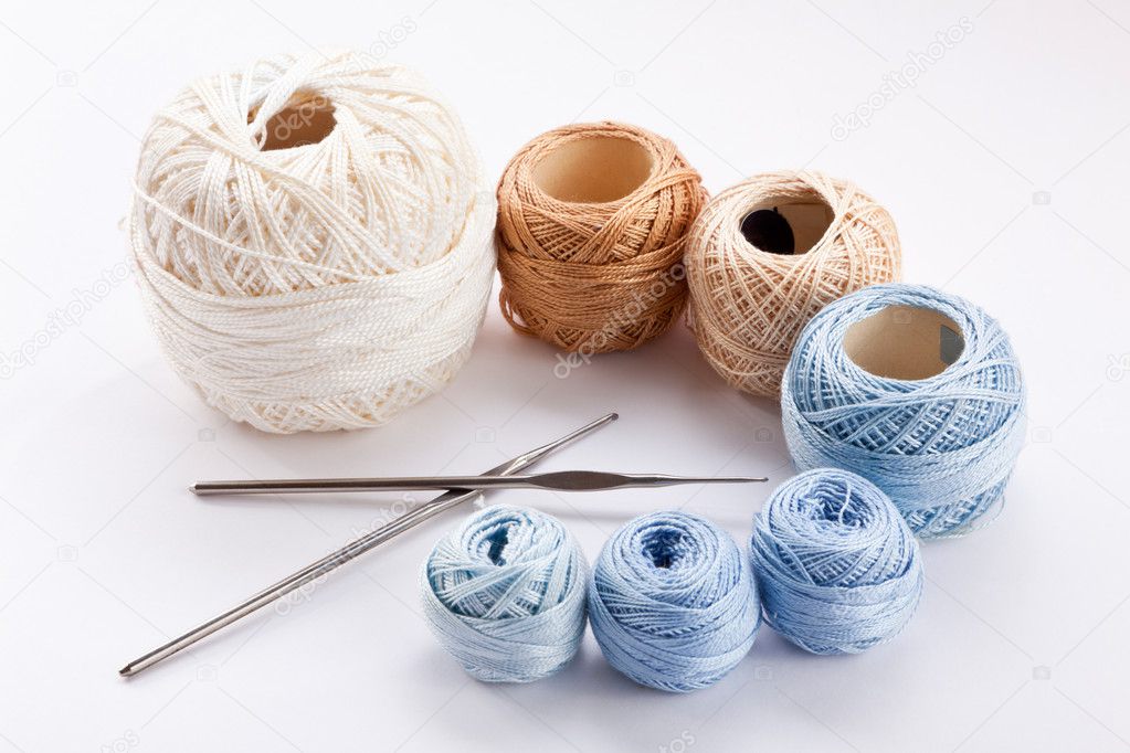 Skeins of colored yarn and crochet