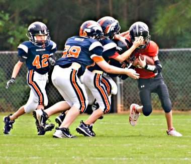 Youth League Football Tackling the Runner clipart