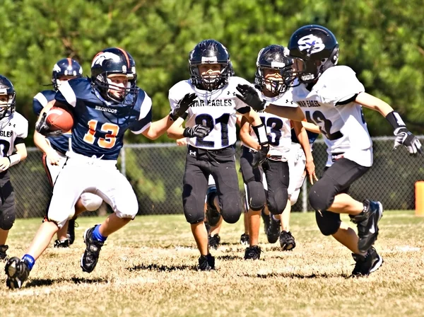 Youth League Football Running With Ball — Stock Photo, Image