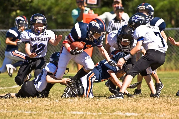 Youth League Football Running With Ball Royalty Free Stock Images