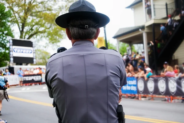 Policeman at Bicycle Race — Stock Photo, Image
