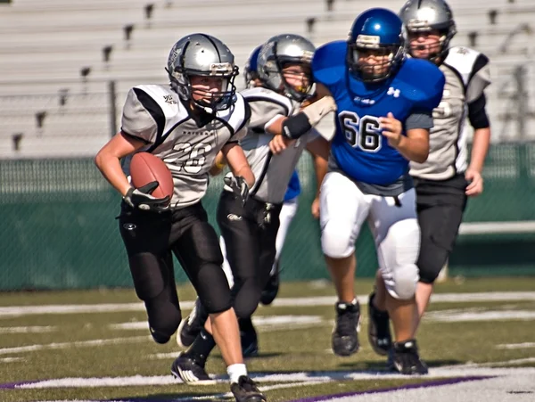 Youth League Football Running the Ball — Stock Photo, Image