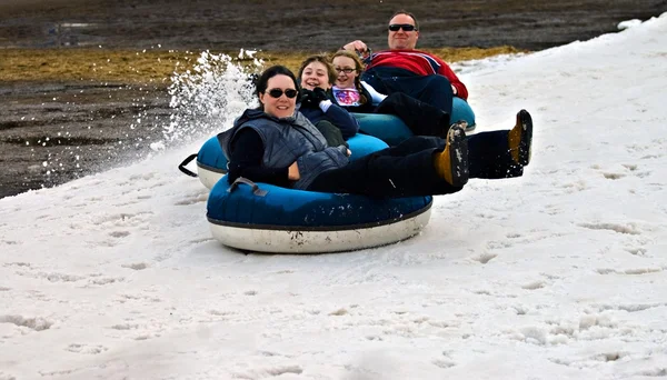 Family on Snow Tubes — Stock Photo, Image