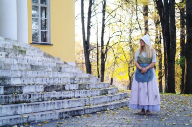 Girl actress plays the role of Cinderella's fairy tale about the old m clipart