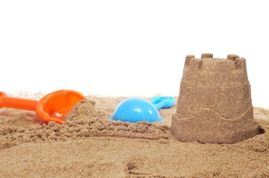 Sandcastle and beach shovels clipart