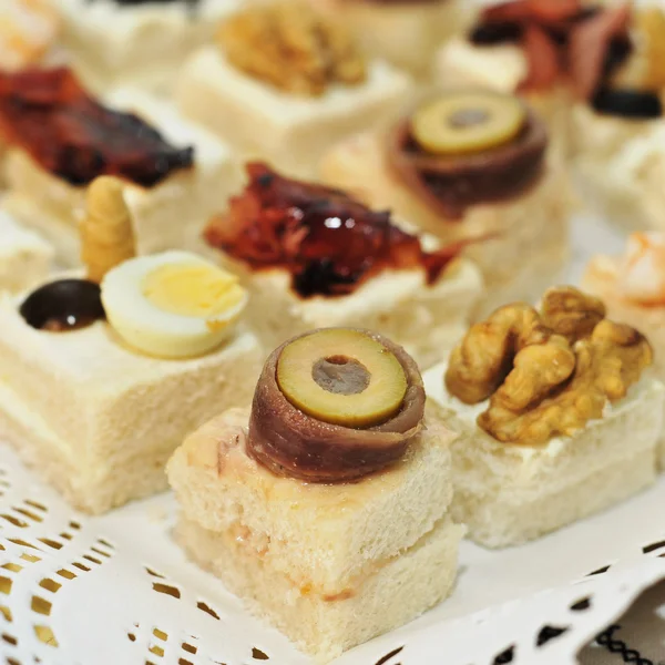 Pile of different canapes — Stock Photo, Image