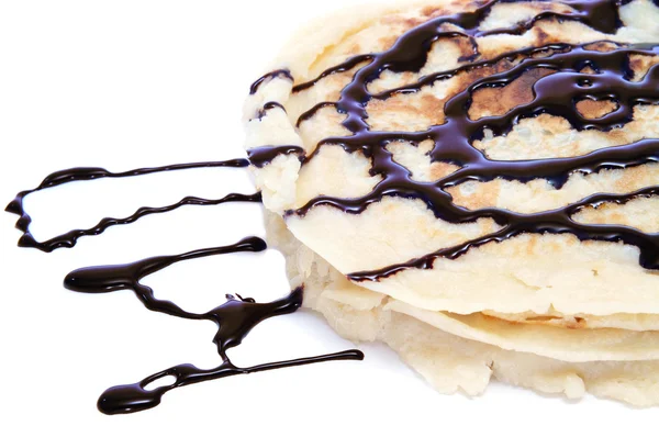 Pancakes with chocolate syrup — Stock Photo, Image