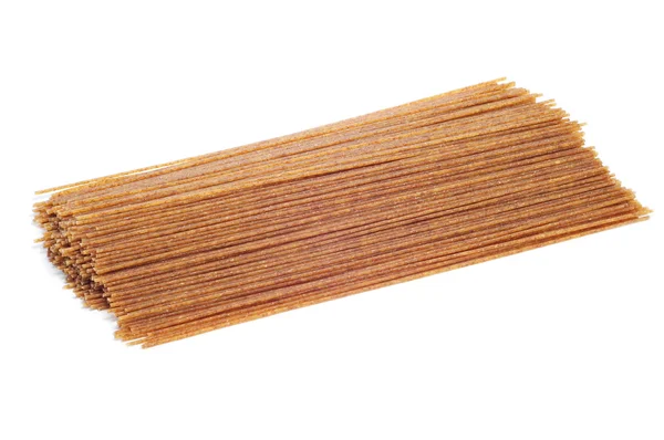 Surowy pełnoziarniste spaghetti — Zdjęcie stockowe
