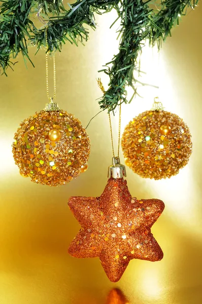 Christmas ornaments on a christmas tree — Stock Photo, Image