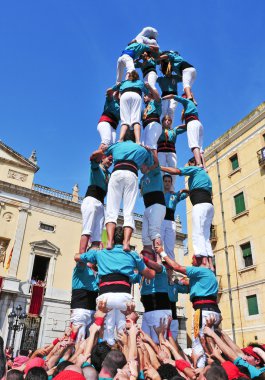 Castells, human towers in Tarragona, Spain clipart