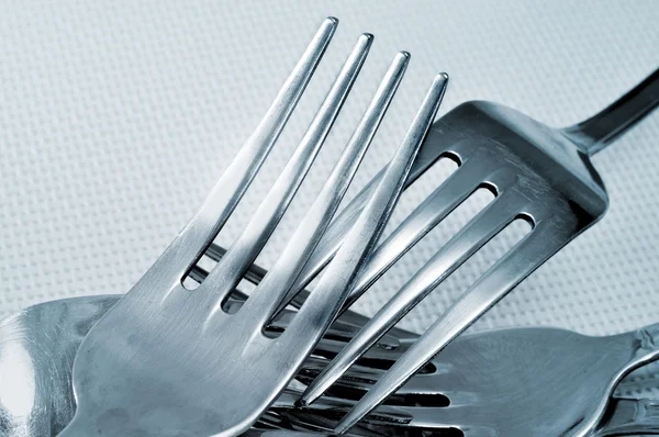Primo piano di una pila di forchette — Foto Stock