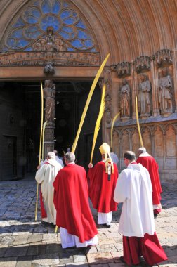 Archbishop of Tarragona entering the Cathedral after the blessin clipart