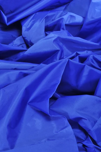Blauw satijnen stof — Stockfoto