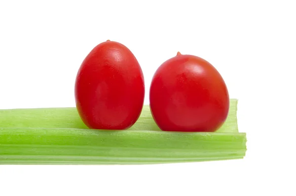 Cherry tomatoes and celery — Stock Photo, Image