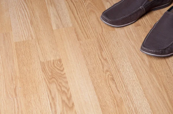 Cipők a padlón — Stock Fotó
