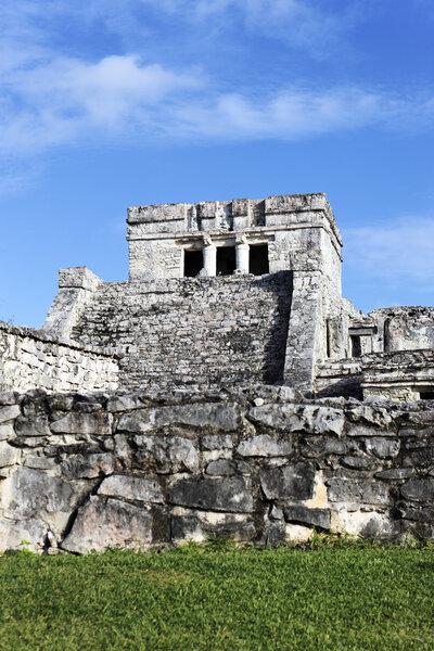 Famous archaeological ruins of Tulum in Mexico with blue sky