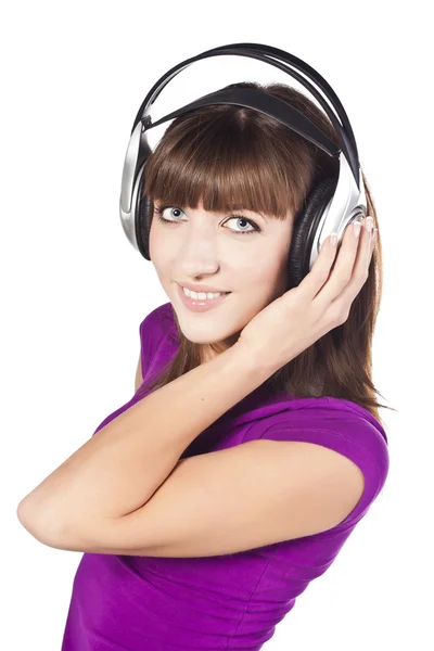 Csinos, fiatal nő hallgat zenét — Stock Fotó
