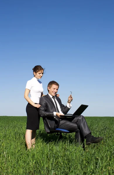 stock image Two contemporary businesspeople at a meeting