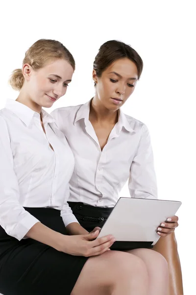 Portrait of two young businesswomen in the studio — Stock Photo, Image