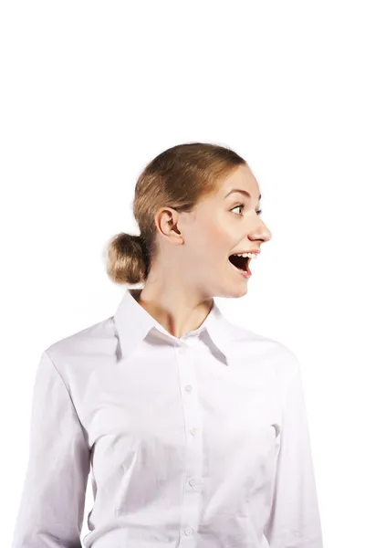 Surprised girl pointing at copy space — Stock Photo, Image