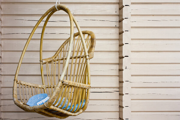 Swinging bench in the garden