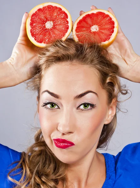 Blonde with Grapefruit, with red lipstick — Stock Photo, Image