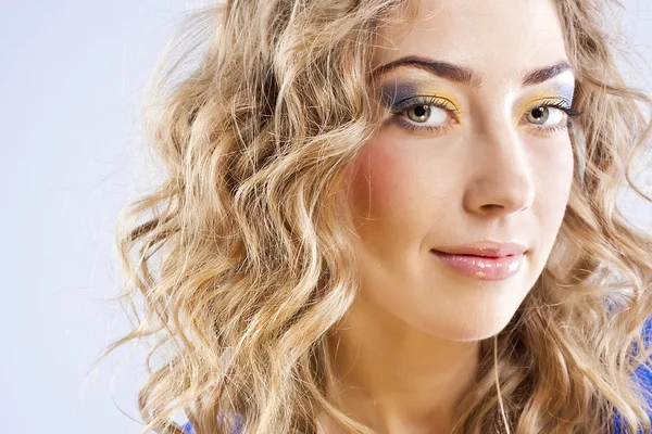 Curly blonde with bright makeup — Stock Photo, Image
