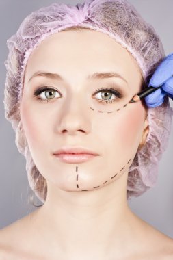 Cosmetic botox injection in the female face. clipart